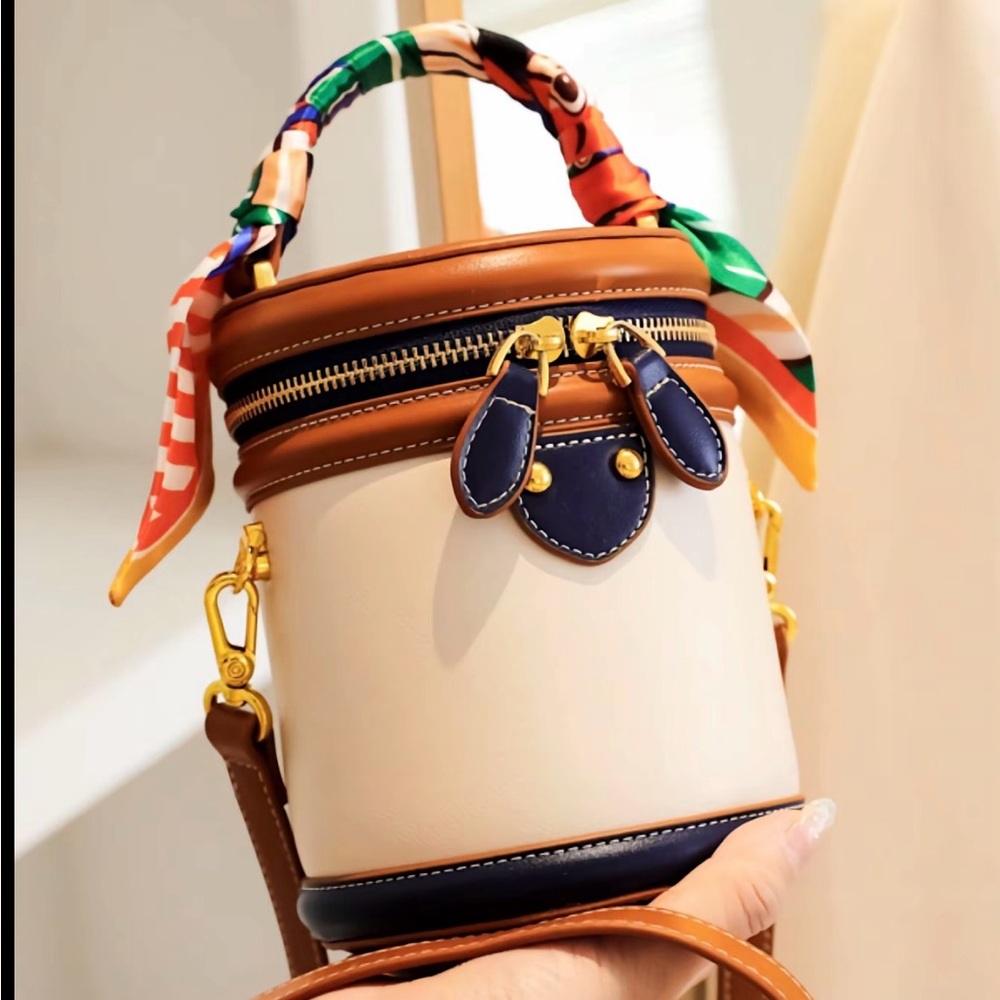 Elegant Cream and Brown Cylinder Crossbody Bag